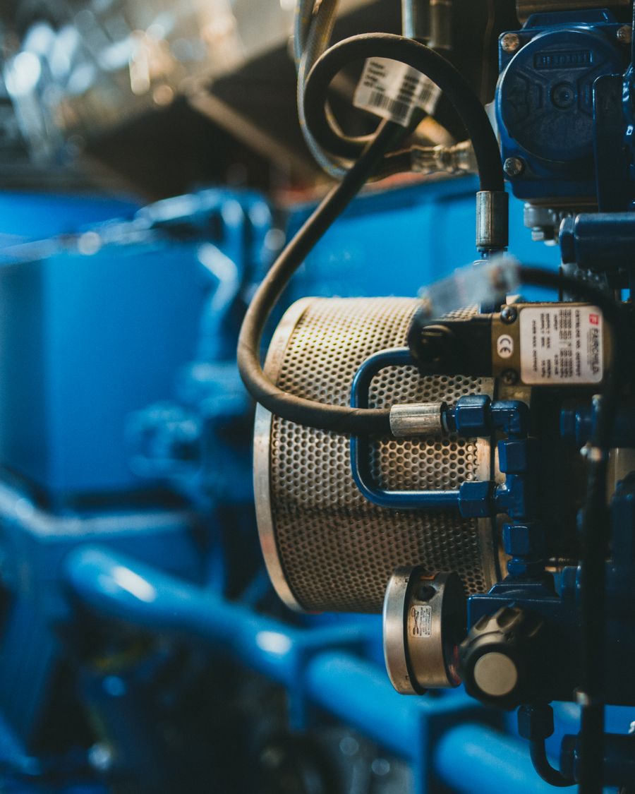 Close-up of wiring and components inside an industrial generating set